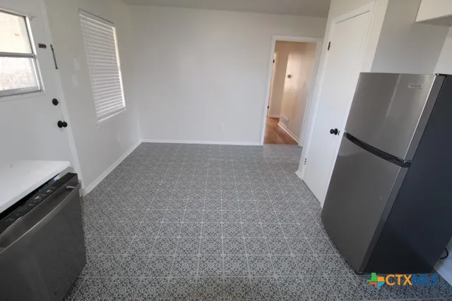 a view of a closet in the kitchen