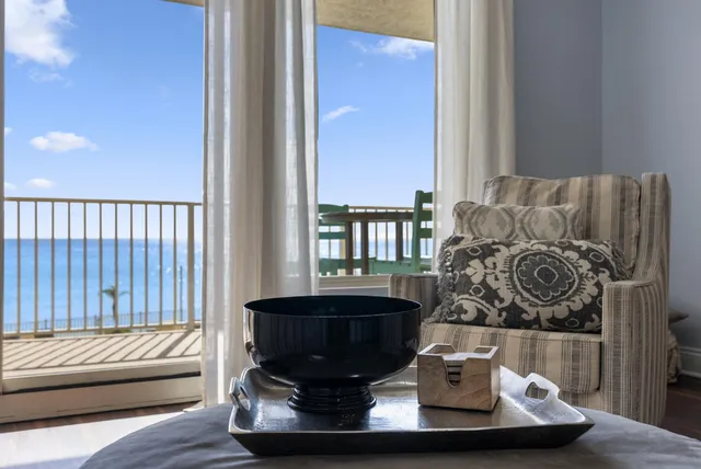 a large kitchen with cabinets table and chairs
