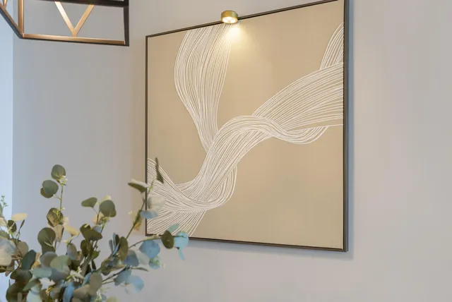 a vase of flowers sitting on a table