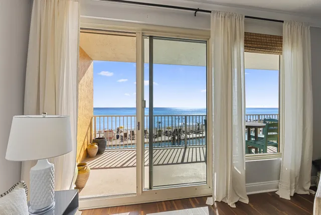 a stove top oven sitting inside of a kitchen