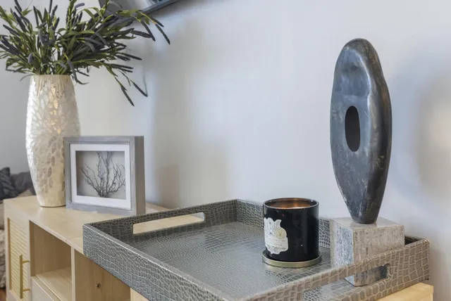 a large kitchen with a table and chairs