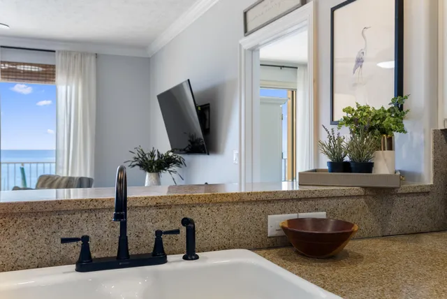 a bedroom with a bed and a mirror