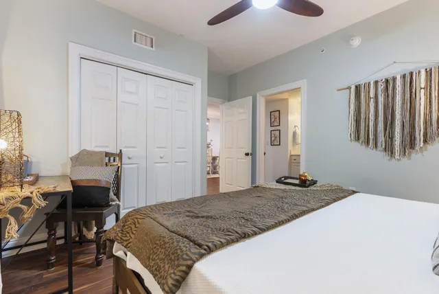 a bathroom with a sink vanity and mirror