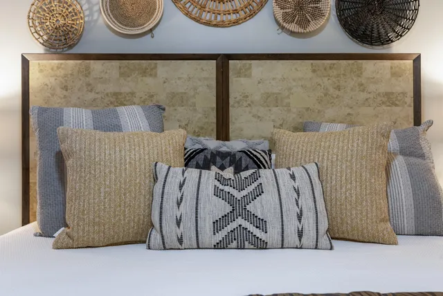 a view of a terrace with furniture and floor to ceiling window