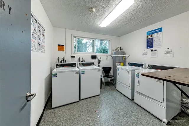a view of cars parked in front of a building