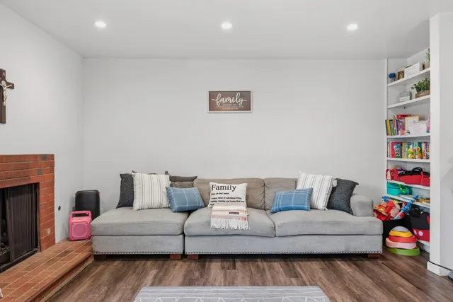 a kitchen with a sink and a stove top oven
