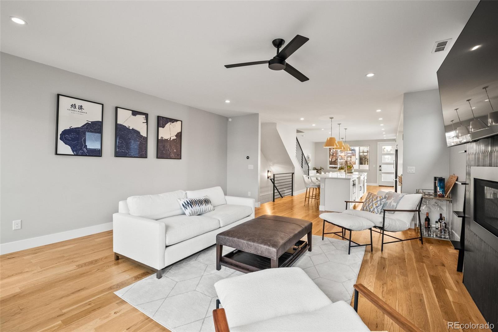3612 Vallejo Street Denver, CO 80211 - Photo 12 of 50 a living room with furniture and kitchen view