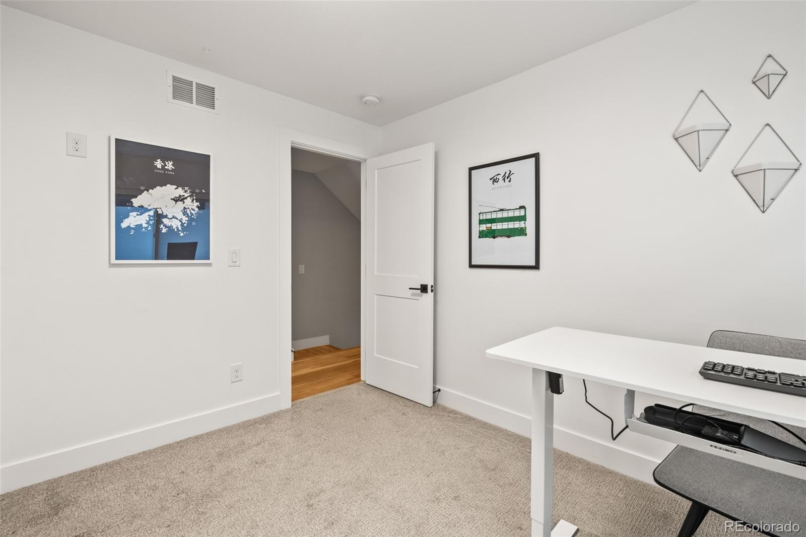 3612 Vallejo Street Denver, CO 80211 - Photo 28 of 50 a view of a workspace with furniture and a window