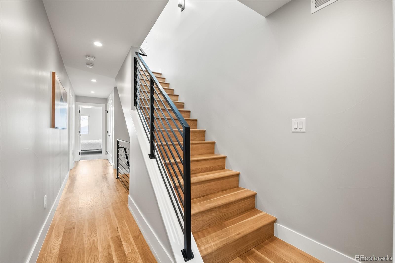 3612 Vallejo Street Denver, CO 80211 - Photo 31 of 50 a view of entryway and hall with wooden floor