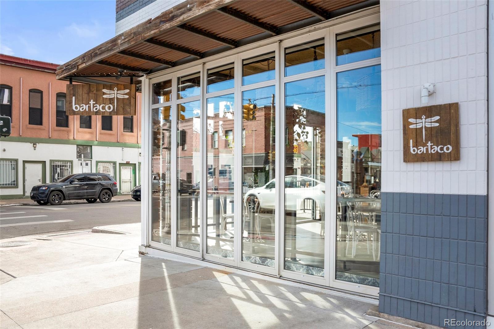 3612 Vallejo Street Denver, CO 80211 - Photo 49 of 50 a view of a building with a door and a chair
