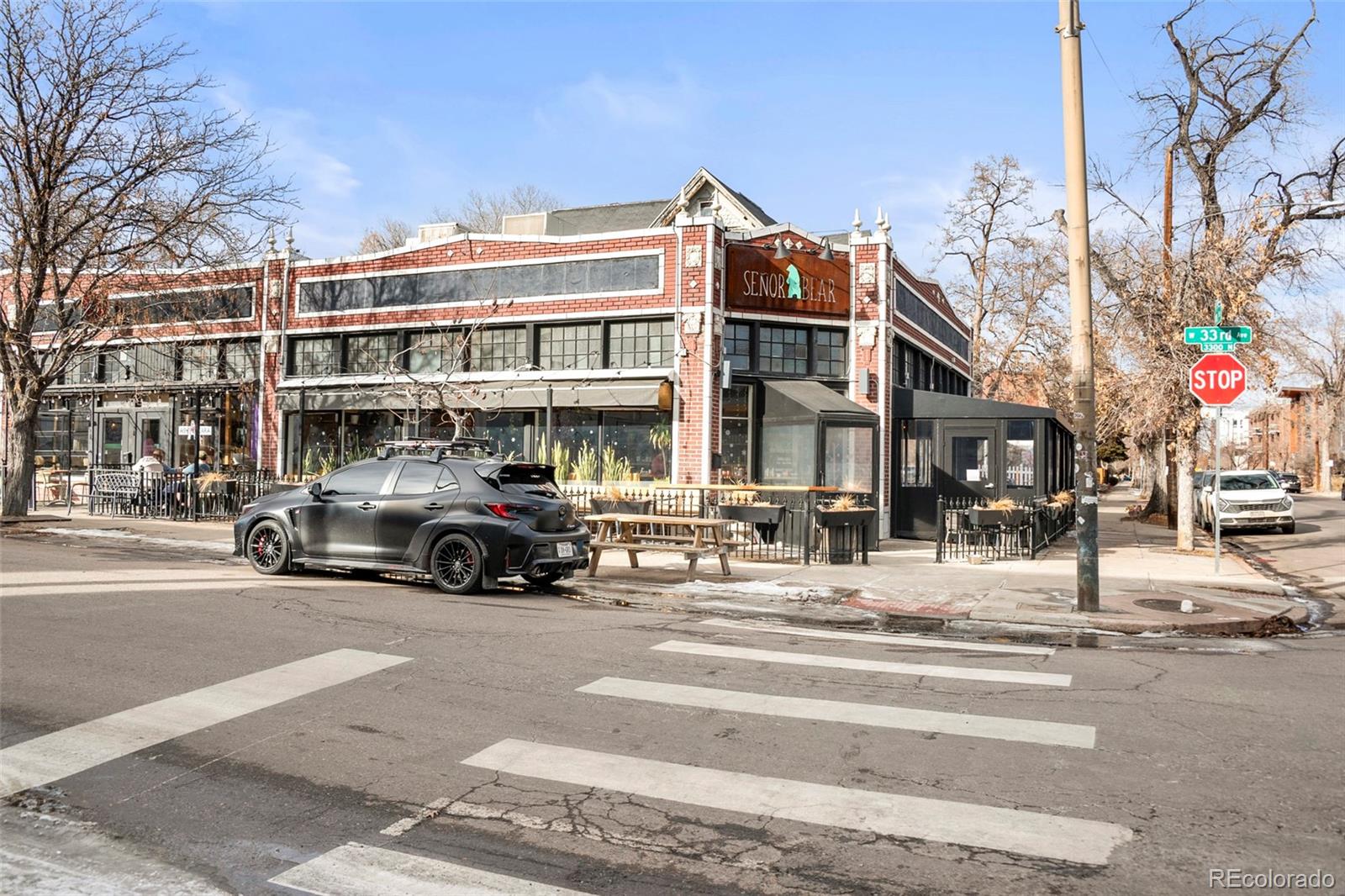 3612 Vallejo Street Denver, CO 80211 - Photo 50 of 50 a car parked in front of a building