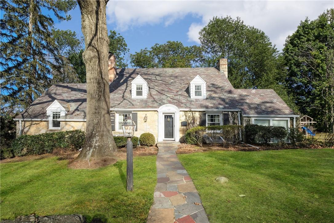 Welcome home to 120 Inverness Road - located in HIGHLY SOUGHT-AFTER Edgemont School District (Seely Elementary School)