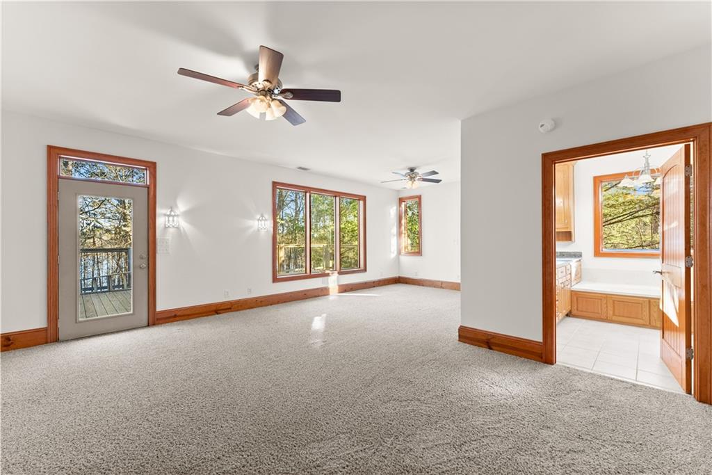 287 Spring Branch Circle Toccoa, GA 30577 - Photo 24 of 75 a view of a livingroom with a ceiling fan and window
