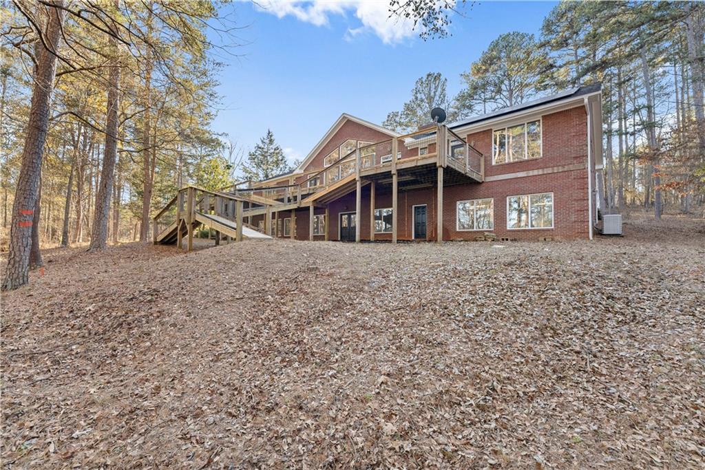 287 Spring Branch Circle Toccoa, GA 30577 - Photo 60 of 75 a front view of a house with large trees