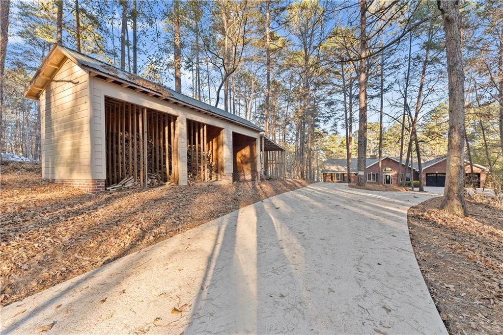 287 Spring Branch Circle Toccoa, GA 30577 - Photo 62 of 75 a front view of a house with a yard and garage