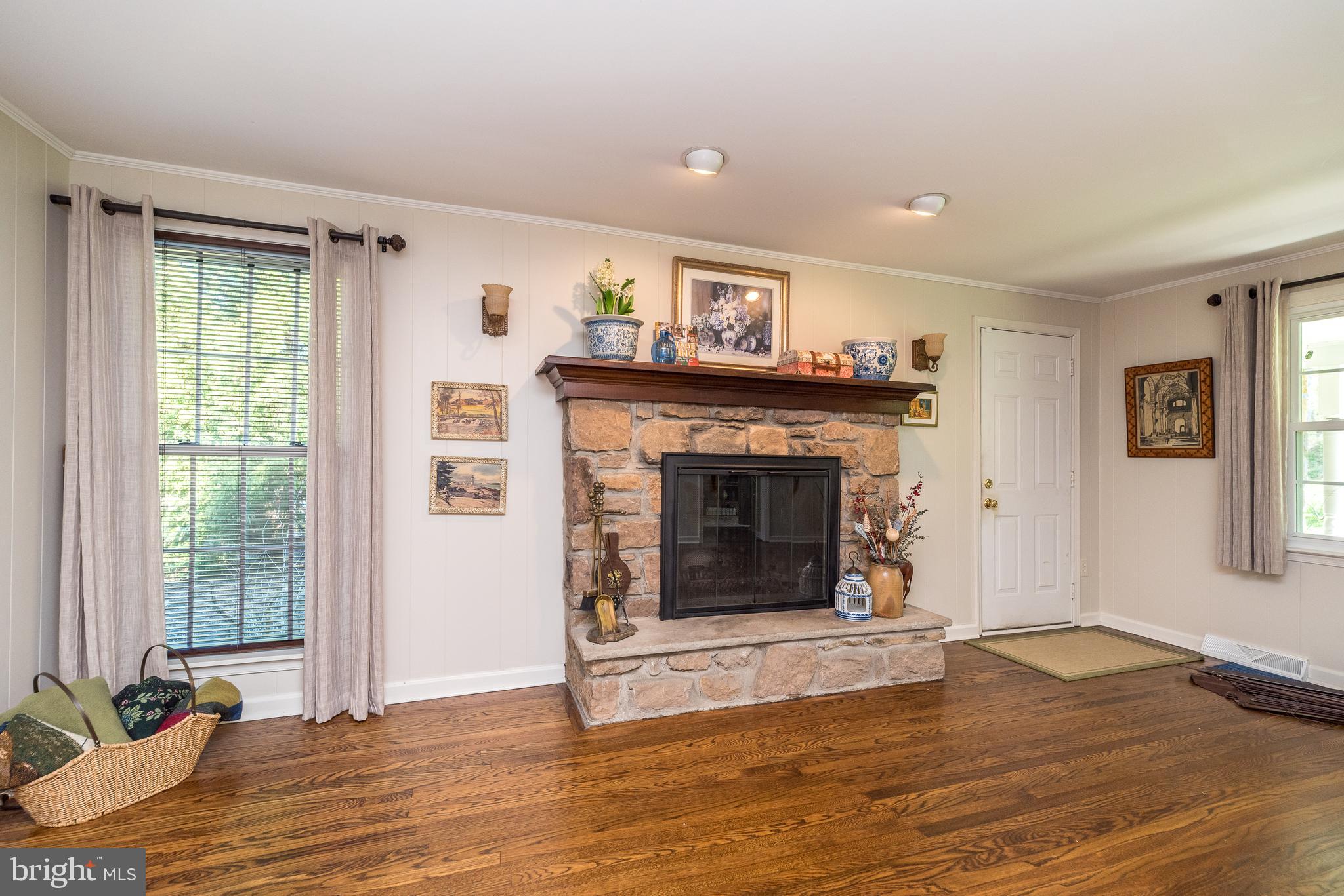 140 Short Road Doylestown, PA 18901 - Photo 18 of 34 a living room with furniture and a fireplace