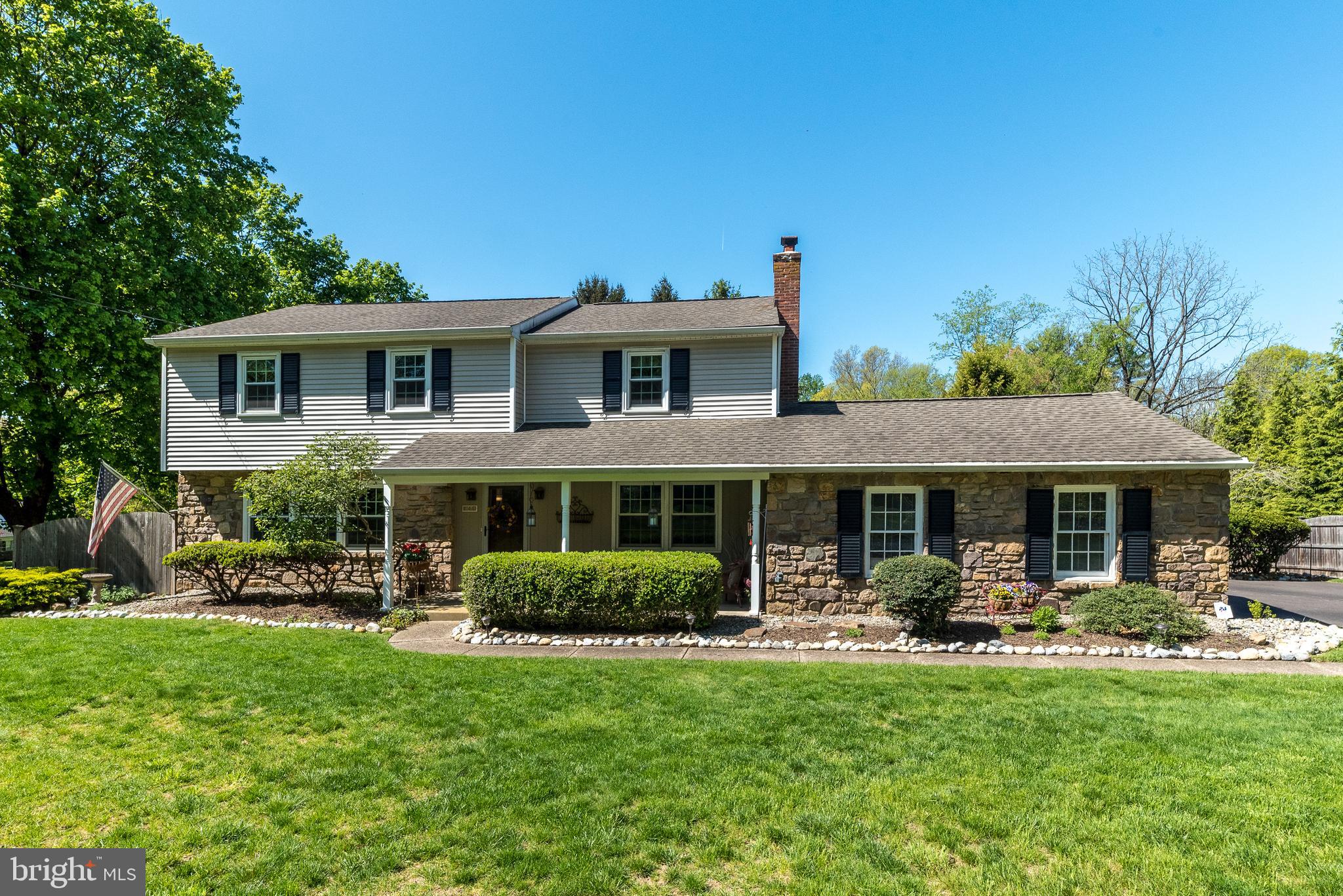 140 Short Road Doylestown, PA 18901 - Photo 2 of 34 a front view of a house with a yard table and chairs