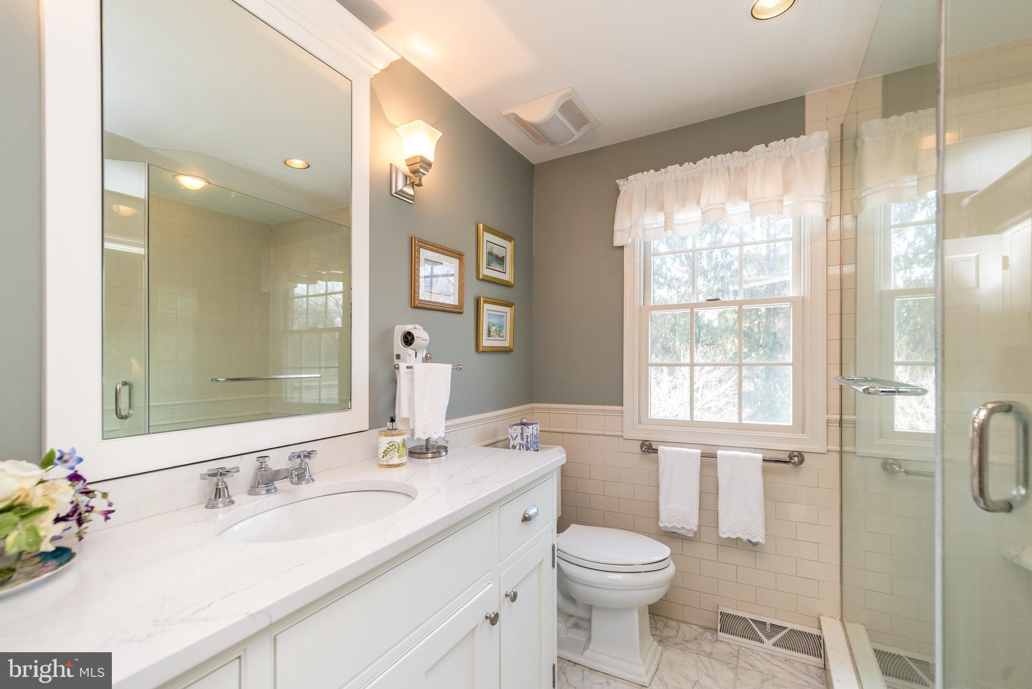 140 Short Road Doylestown, PA 18901 - Photo 22 of 34 a bathroom with a granite countertop sink toilet and shower