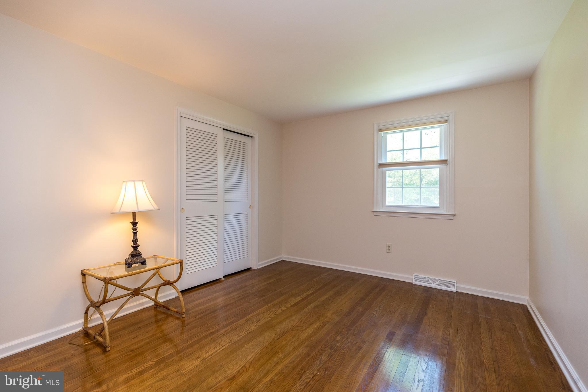 140 Short Road Doylestown, PA 18901 - Photo 27 of 34 wooden floor in an empty room with a window