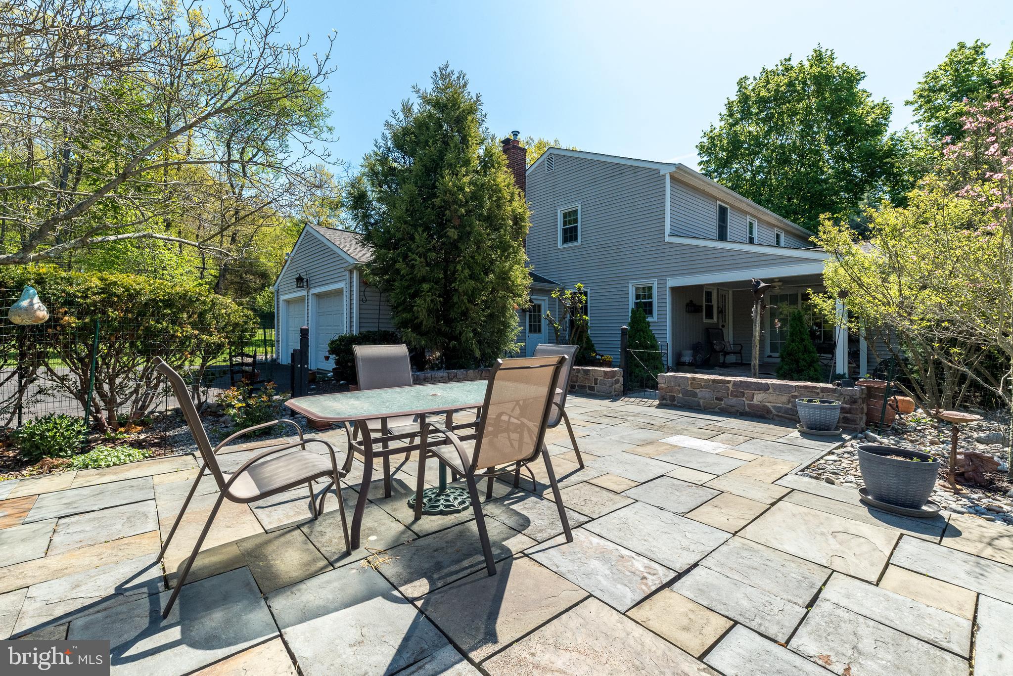 140 Short Road Doylestown, PA 18901 - Photo 30 of 34 a view of a patio with table and chairs and potted plants