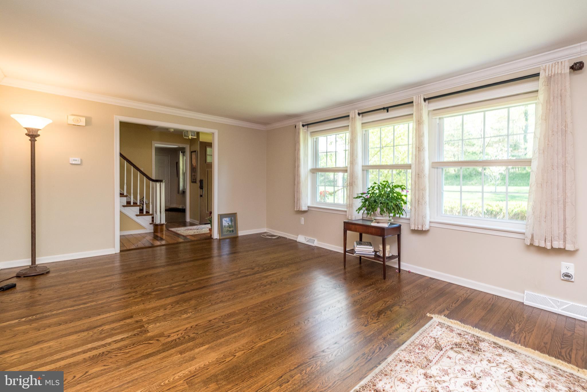 140 Short Road Doylestown, PA 18901 - Photo 5 of 34 wooden floor in an empty room with a window