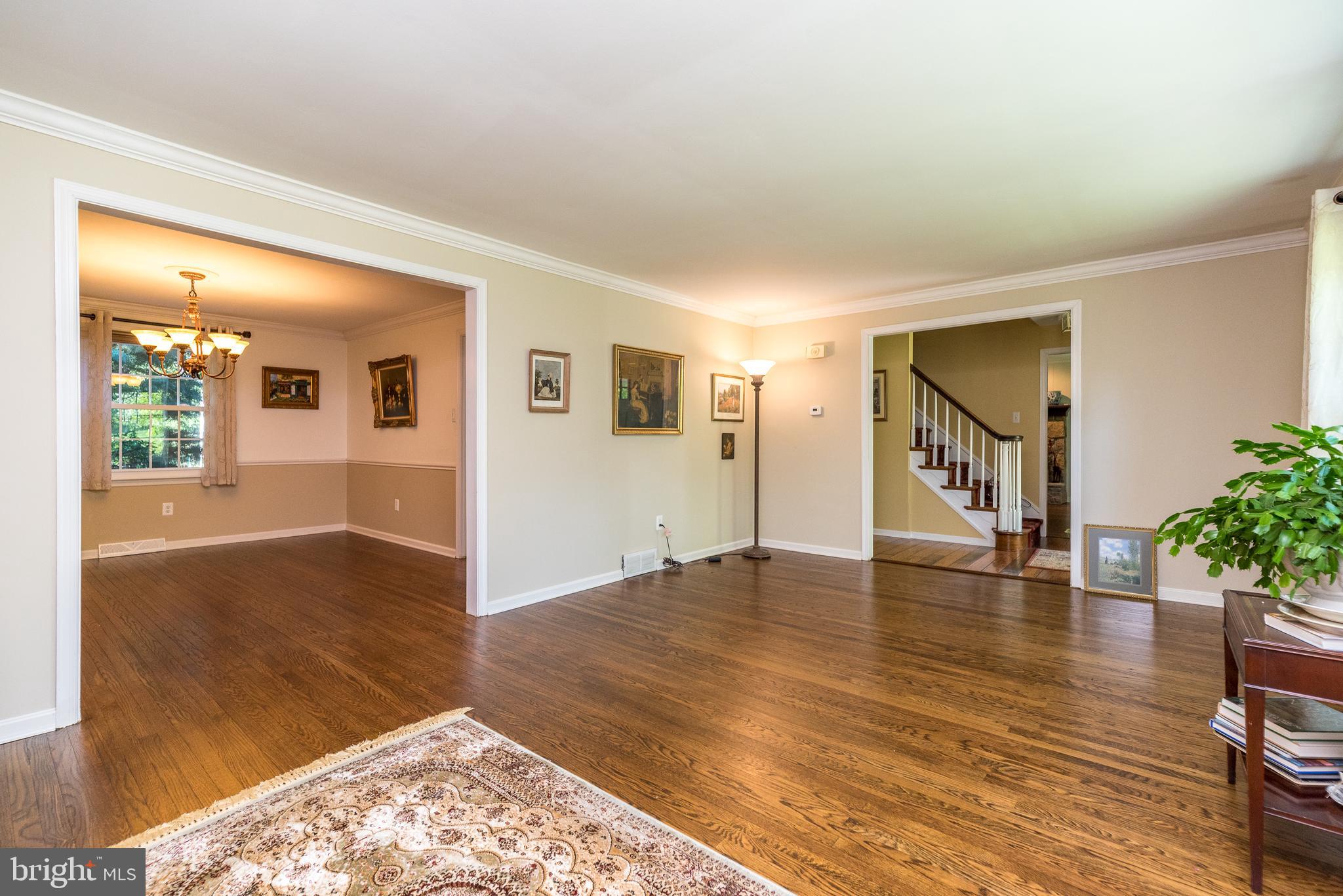140 Short Road Doylestown, PA 18901 - Photo 6 of 34 a view of an empty room with wooden floor and a window