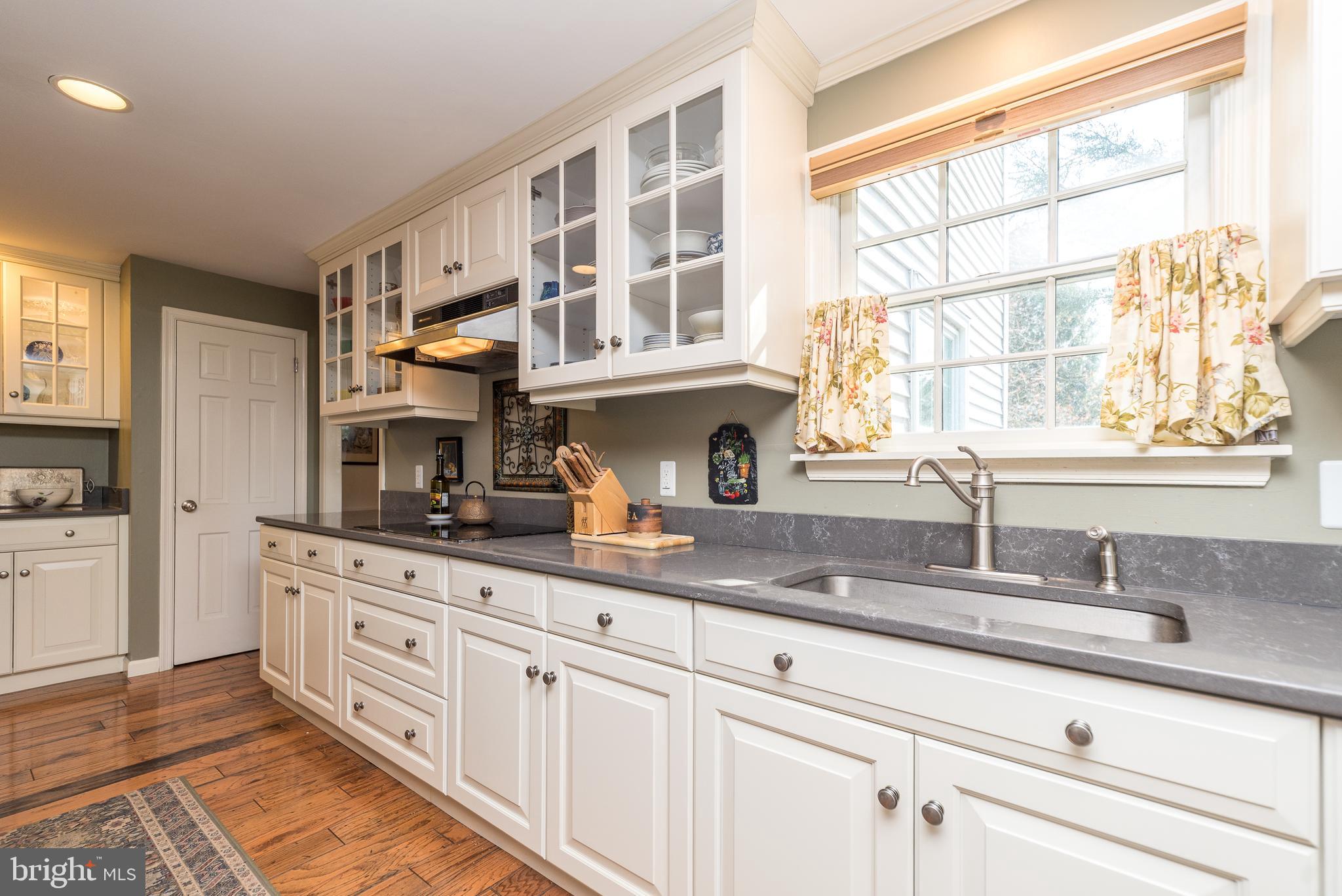 140 Short Road Doylestown, PA 18901 - Photo 10 of 34 a kitchen with stainless steel appliances granite countertop a sink and a window