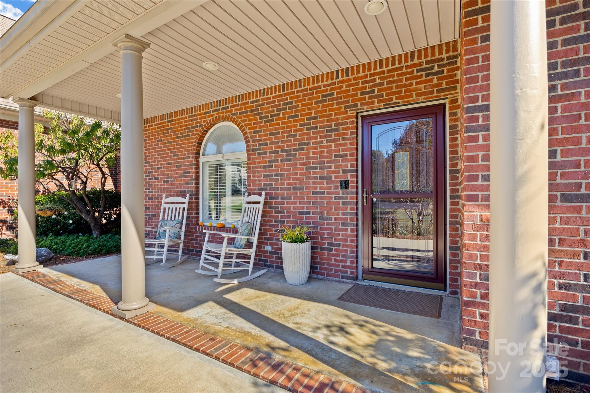 3559 Nestling Lane Fort Mill, SC 29708 - Photo 2 of 42 a view of a patio with a table and chairs and potted plants