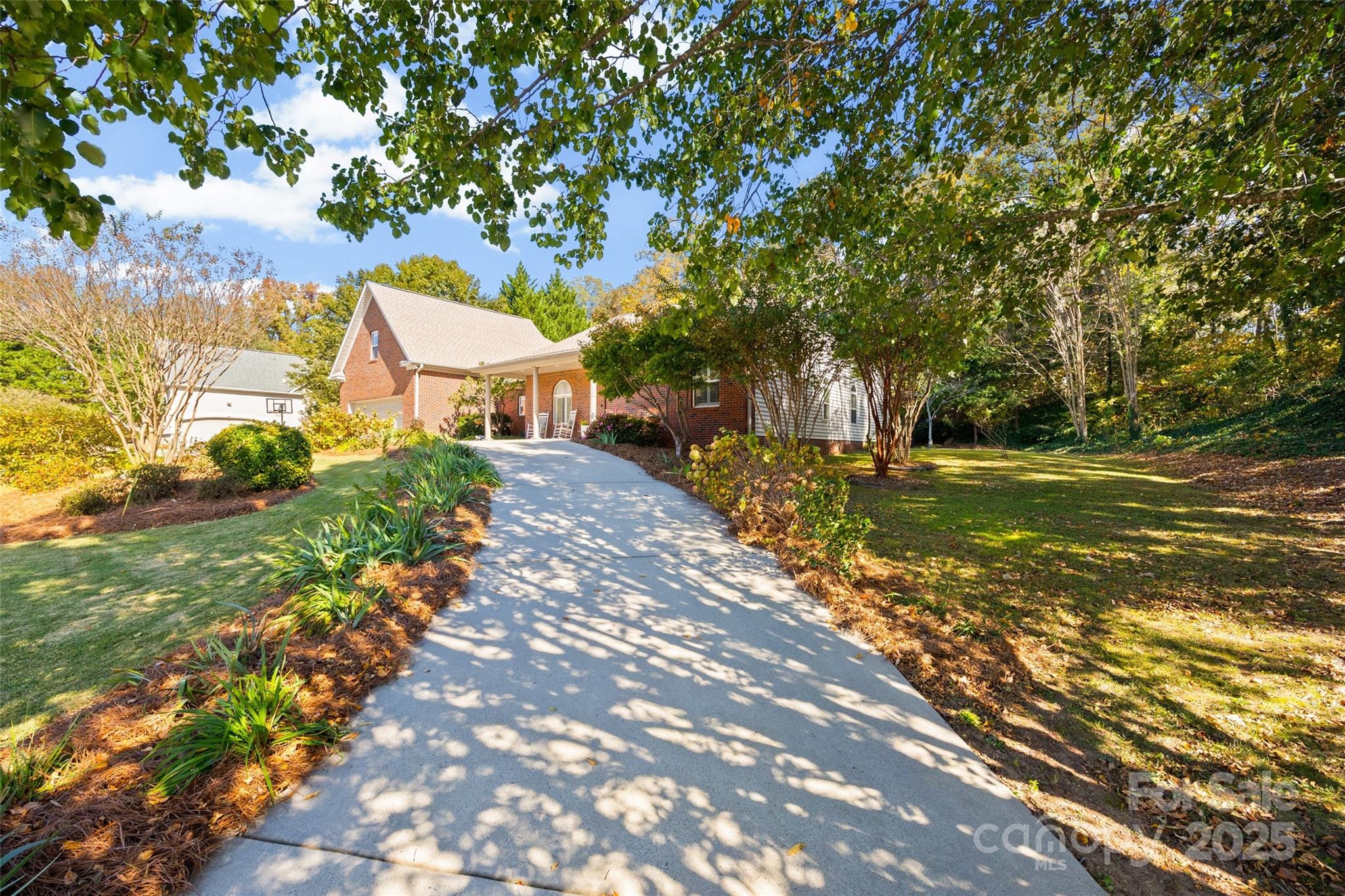 3559 Nestling Lane Fort Mill, SC 29708 - Photo 36 of 42 a view of a house with a yard and sitting area