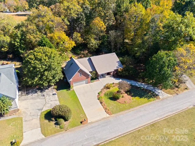 view of backyard with swimming pool and outdoor seating