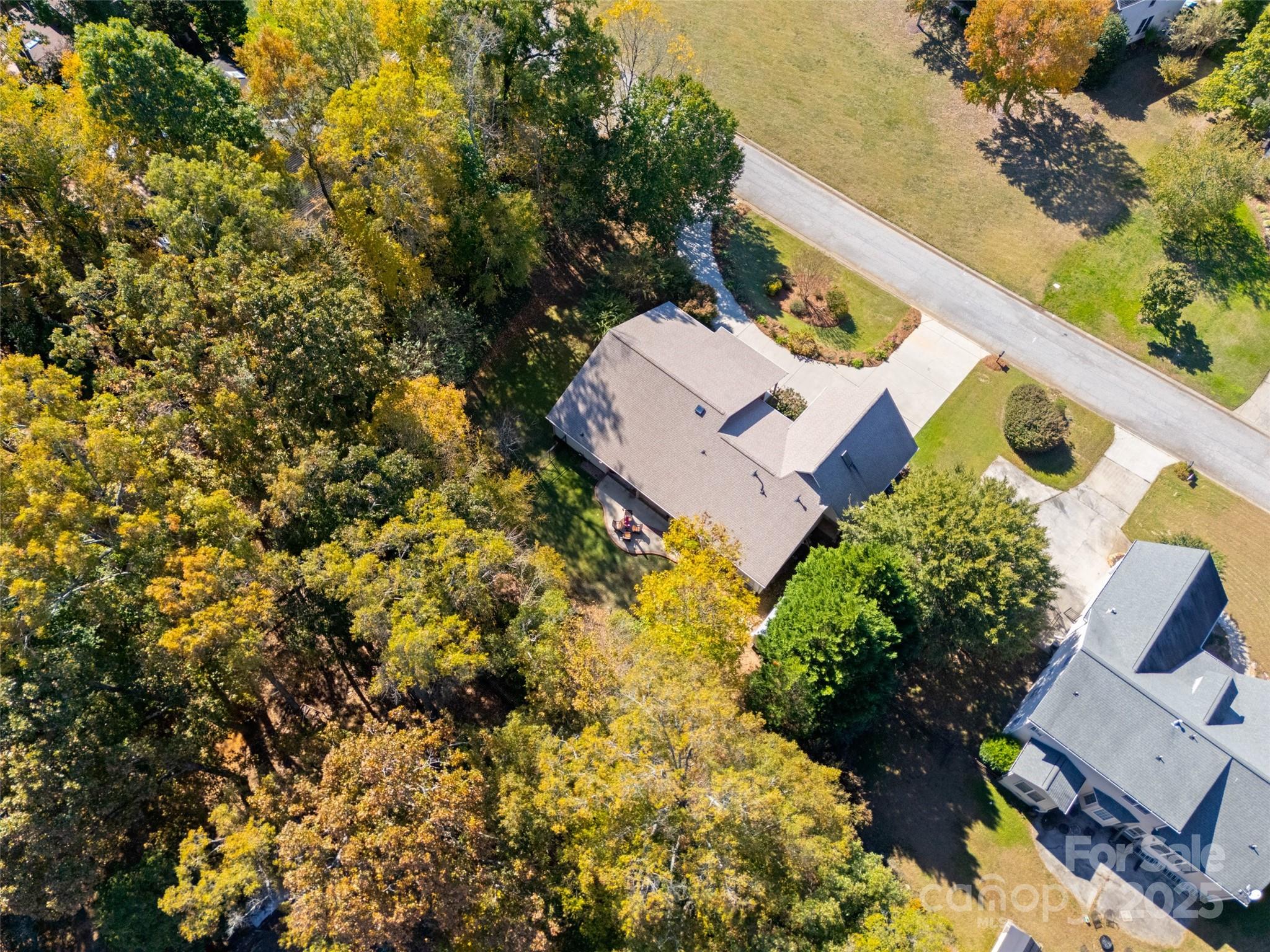 3559 Nestling Lane Fort Mill, SC 29708 - Photo 40 of 42 an aerial view of a house with a yard and garden