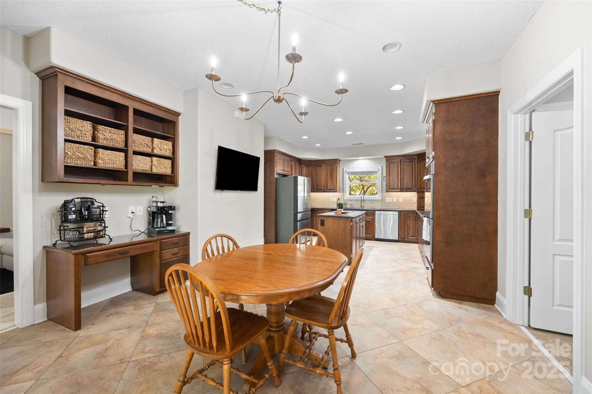 3559 Nestling Lane Fort Mill, SC 29708 - Photo 10 of 42 a view of a dining room with furniture and a kitchen