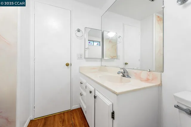 a view of a chair and table in the patio