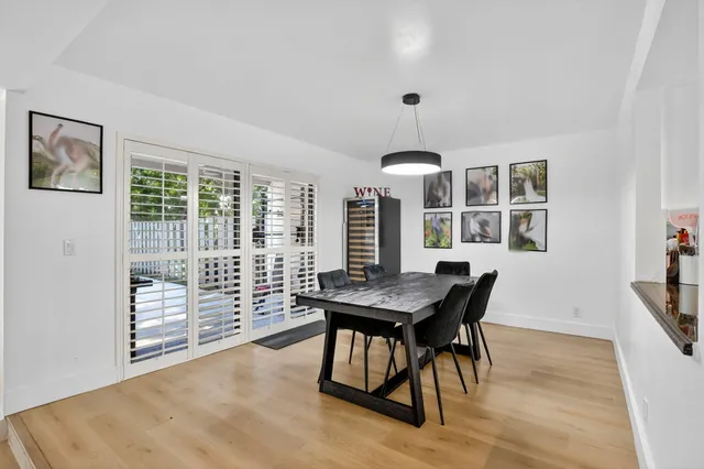 a view of livingroom with hardwood floor and windows
