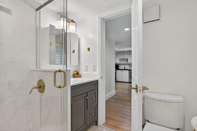 a bed room with a bed and a table