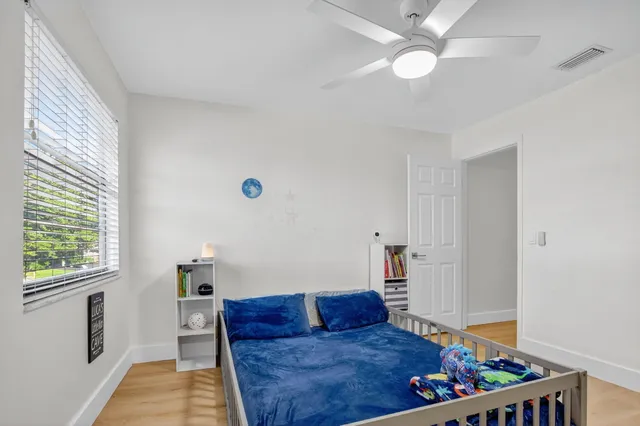 a garden view with a bench in the background