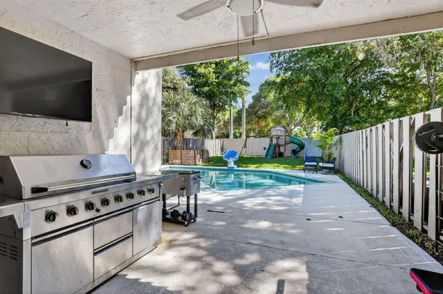 a view of a back yard with green space