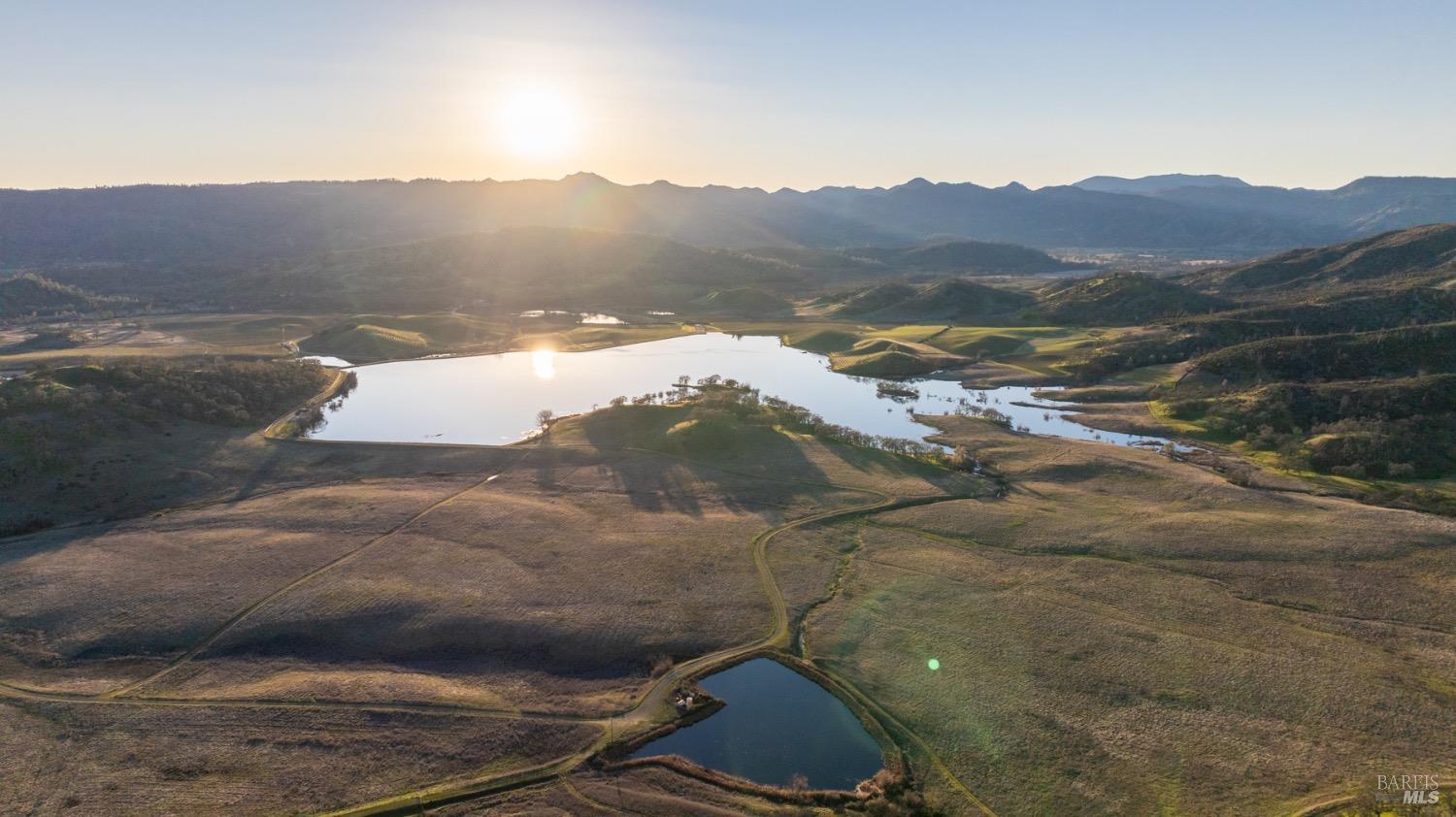 2950 Barnett Road Pope Valley, CA 94567 - Photo 16 of 30 a view of a backyard with a mountain