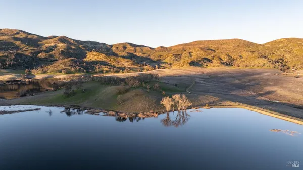 a view of lake with mountain