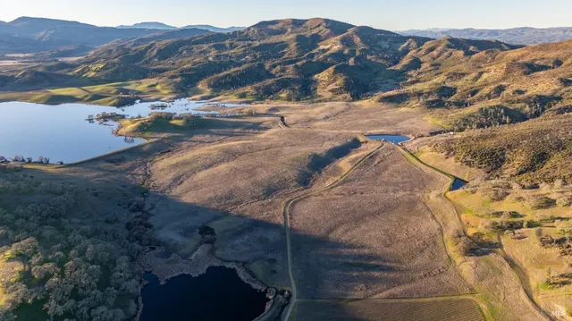 a view of a house with a mountain