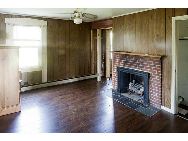 301 Main Road Bradford, ME 04410 - Photo 8 of 28 Living Room. Fireplace in living room