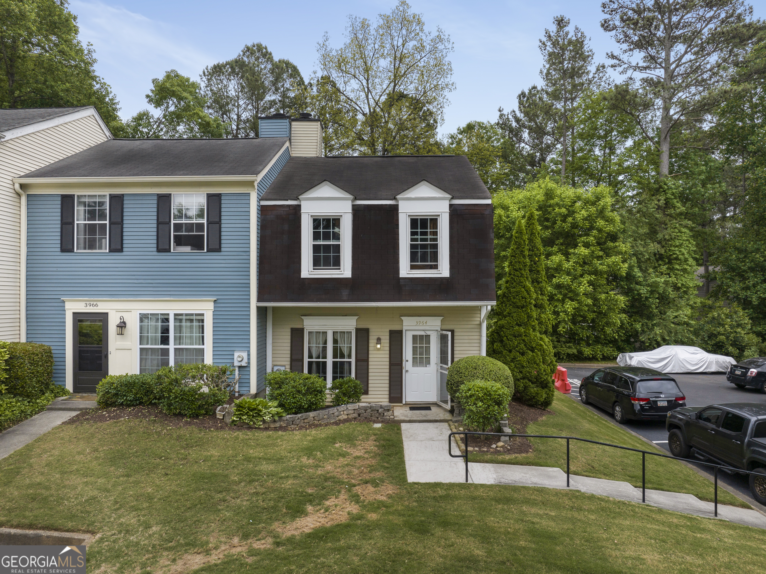 3964 Wolcott Circle Atlanta, GA 30340 - Photo 1 of 1 a front view of a house with a yard