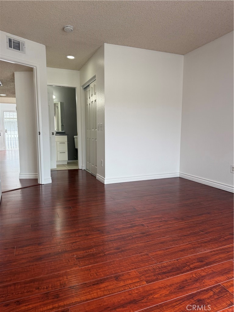 10700 Colima Road, Unit 914 Whittier, CA 90604 - Photo 12 of 14 a view of a livingroom with wooden floor