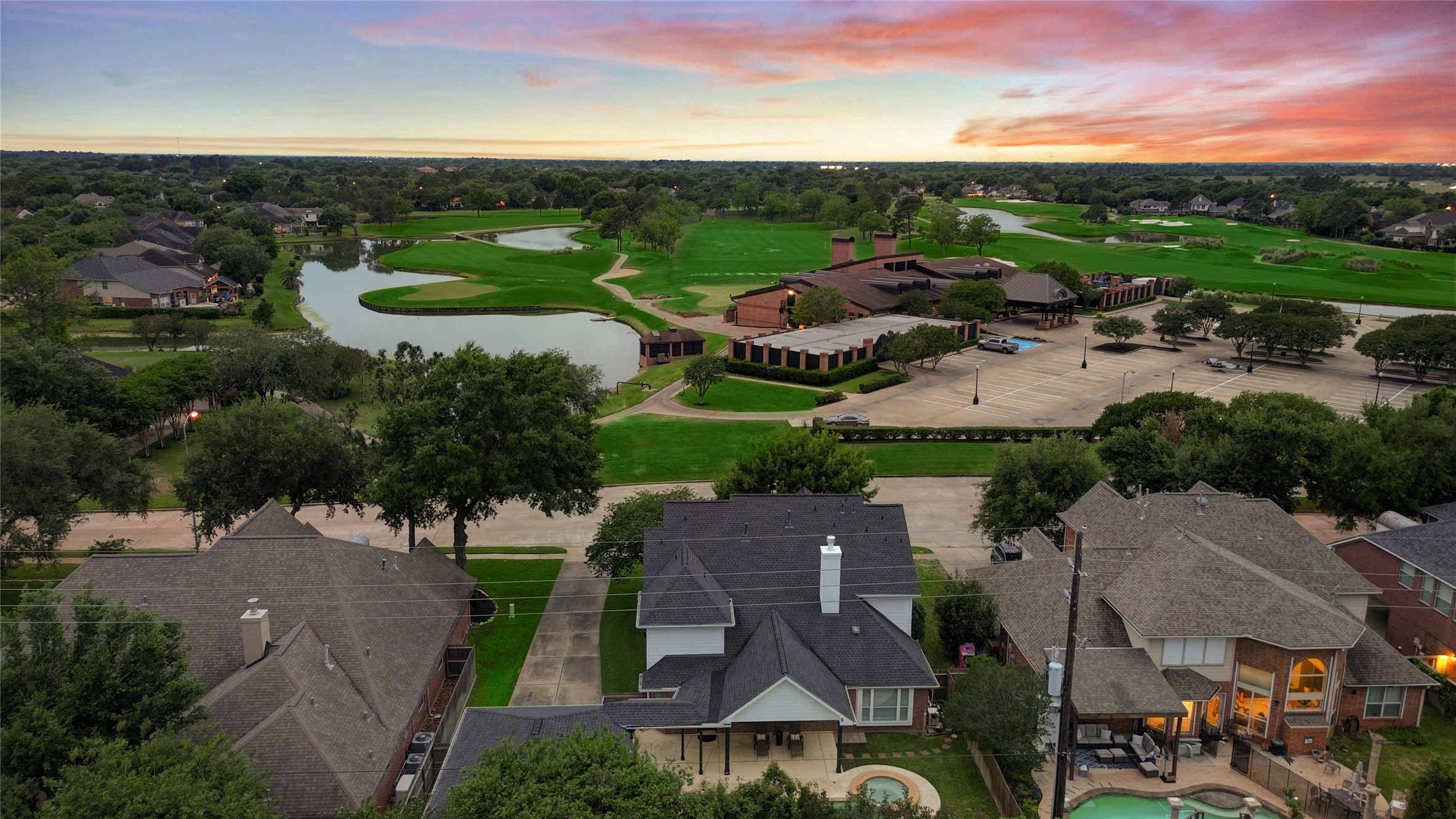 24418 Falcon Point Drive Katy, TX 77494 - Photo 37 of 40 Enjoy an unbeatable location directly across from the golf course, where sweeping green views and serene water features create a picturesque backdrop to everyday living. Imagine morning walks along the fairways, sunset views just steps from your front door, and the convenience of having the clubhouse and amenities right across the street, this is lifestyle living at its finest.