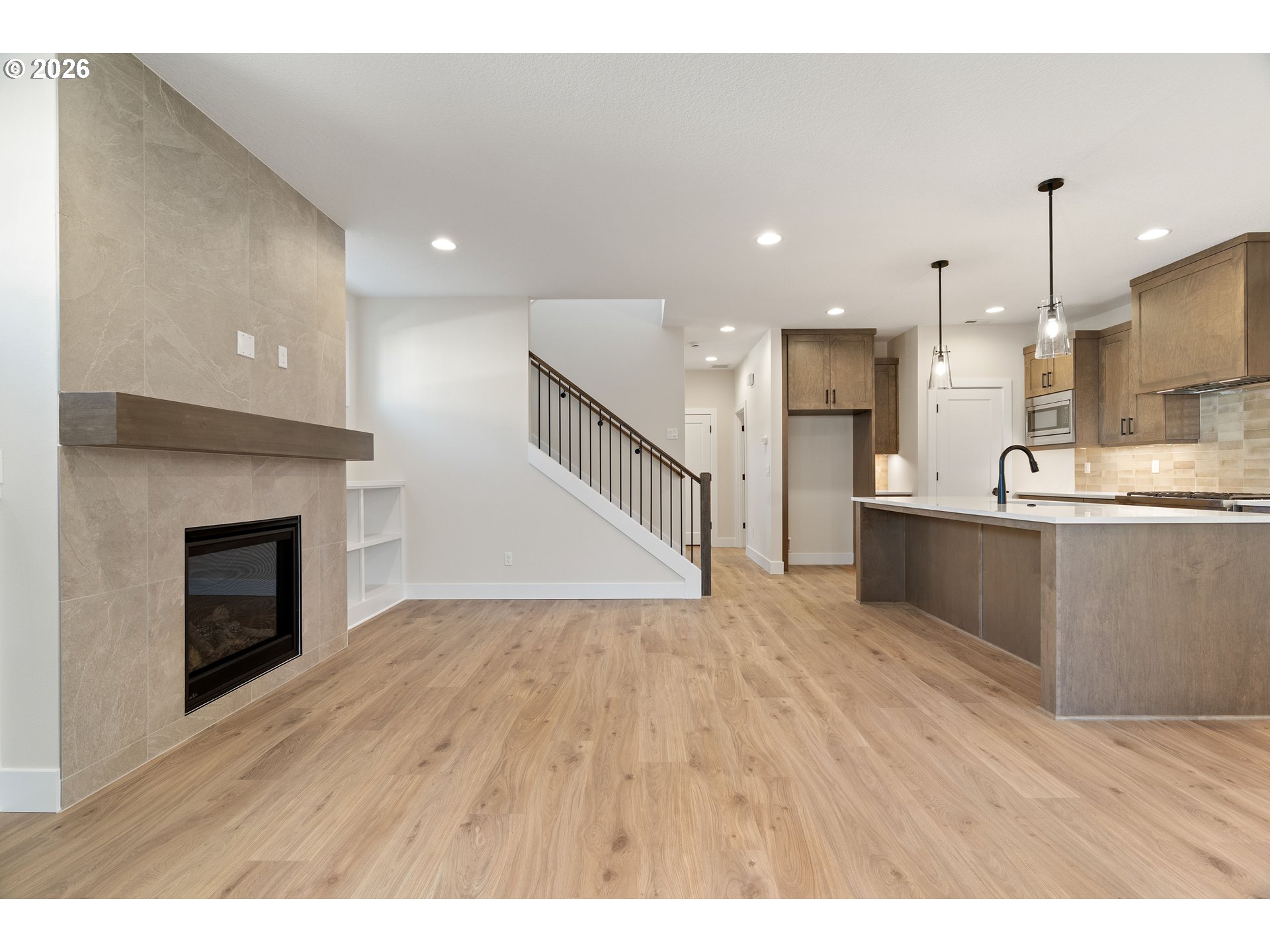2947 Northwest 114th Terrace Portland, OR 97229 - Photo 18 of 46 a view of kitchen with kitchen island wooden floor center island and stainless steel appliances