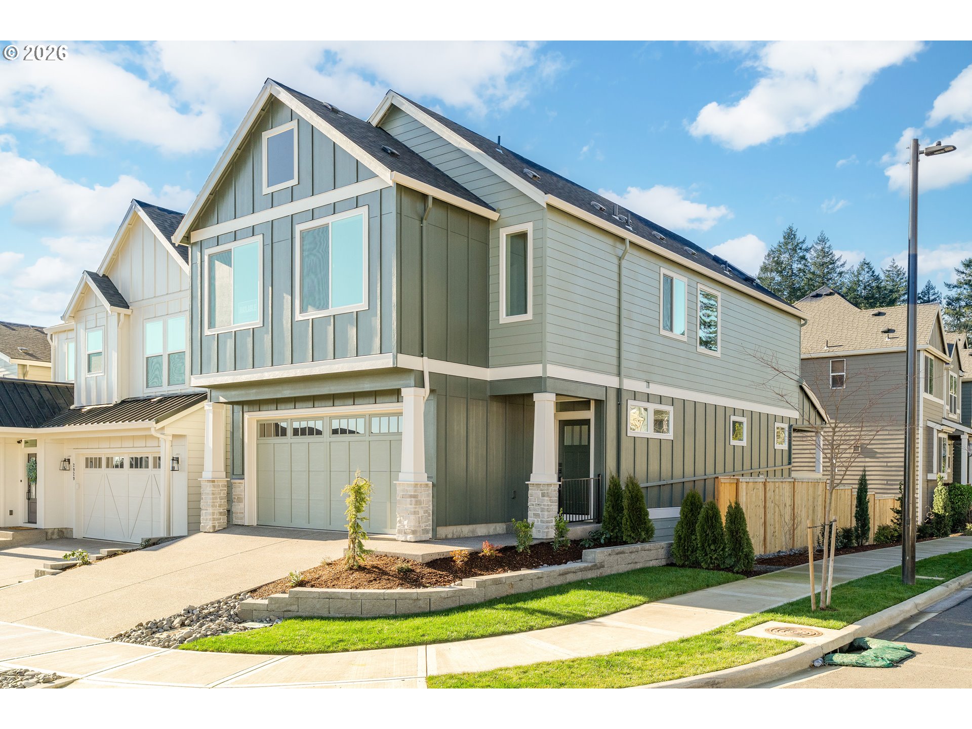 2947 Northwest 114th Terrace Portland, OR 97229 - Photo 2 of 46 a front view of a house with a yard