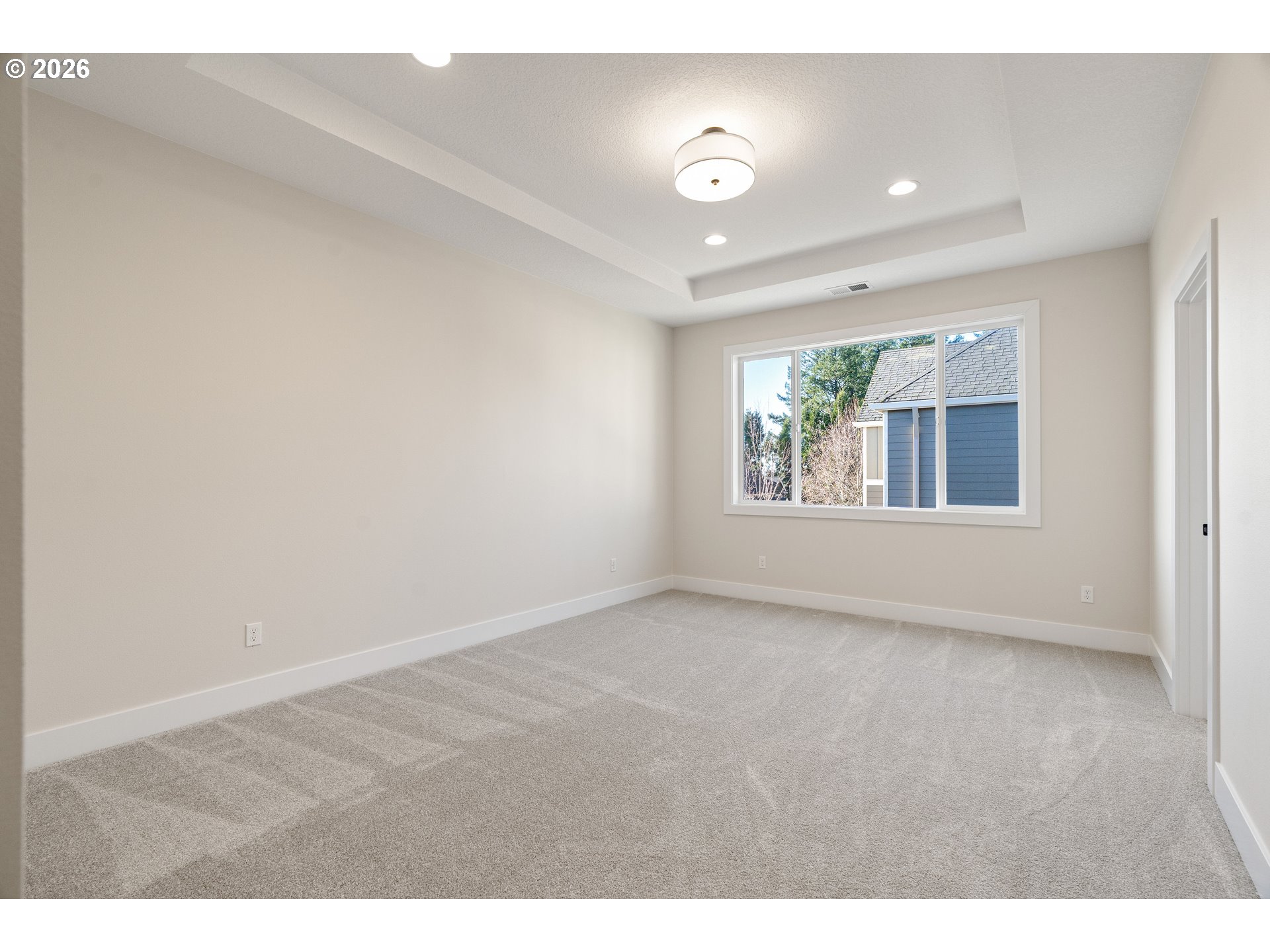 2947 Northwest 114th Terrace Portland, OR 97229 - Photo 21 of 46 a view of an empty room with a window