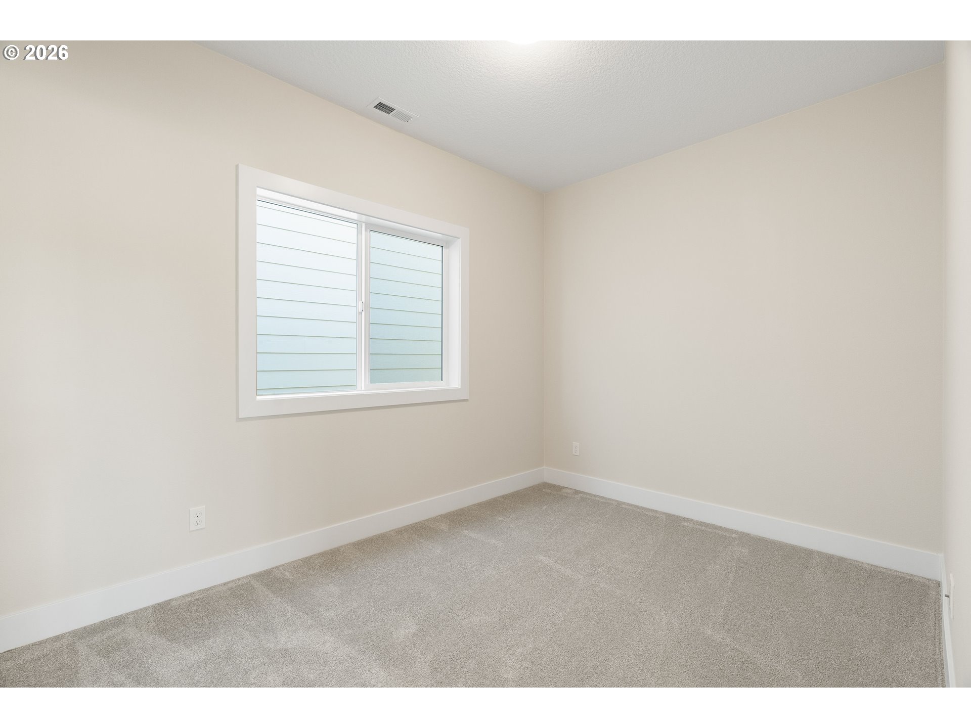 2947 Northwest 114th Terrace Portland, OR 97229 - Photo 29 of 46 an empty room with a window
