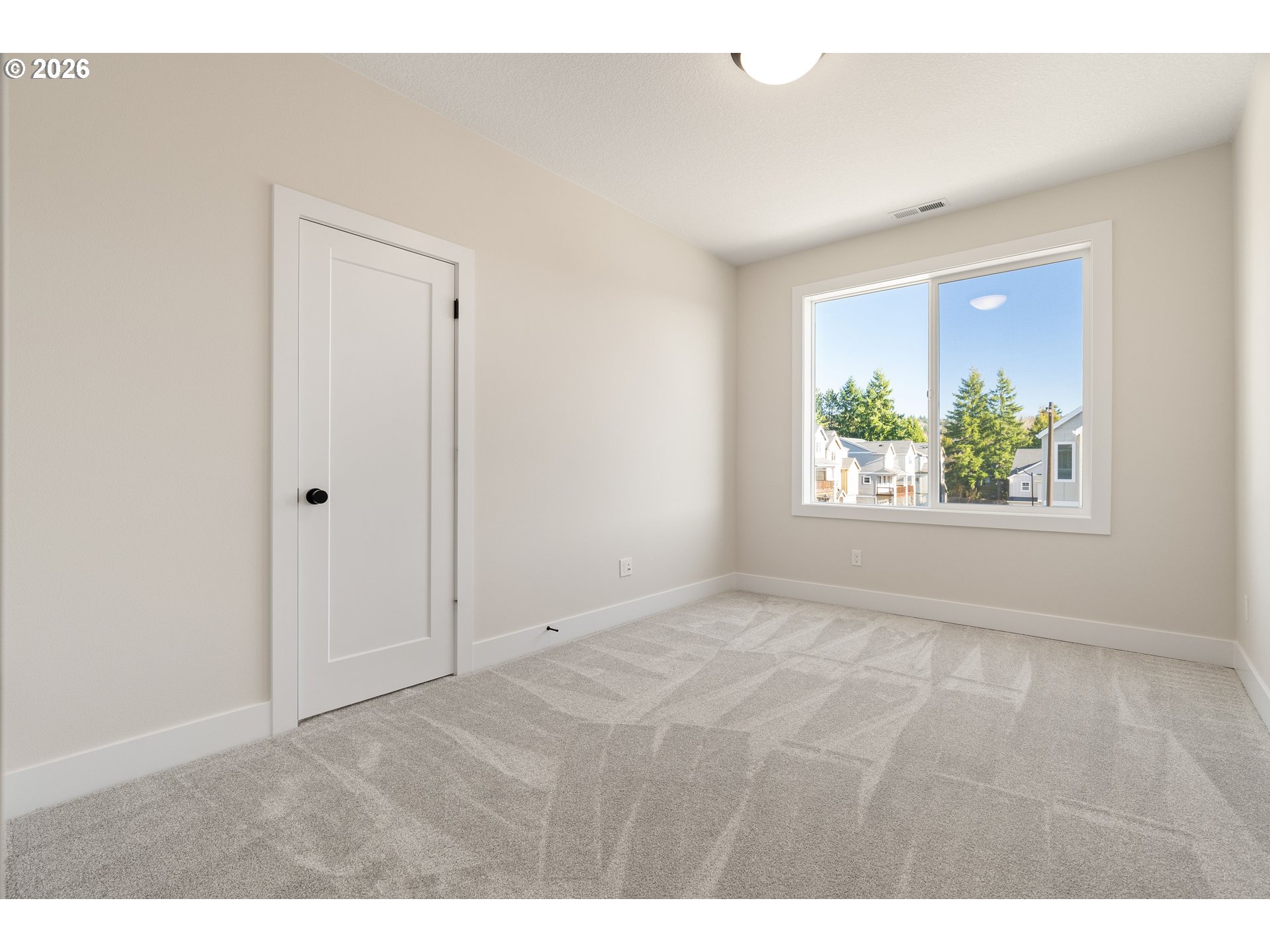 2947 Northwest 114th Terrace Portland, OR 97229 - Photo 35 of 46 a view of an empty room with a window