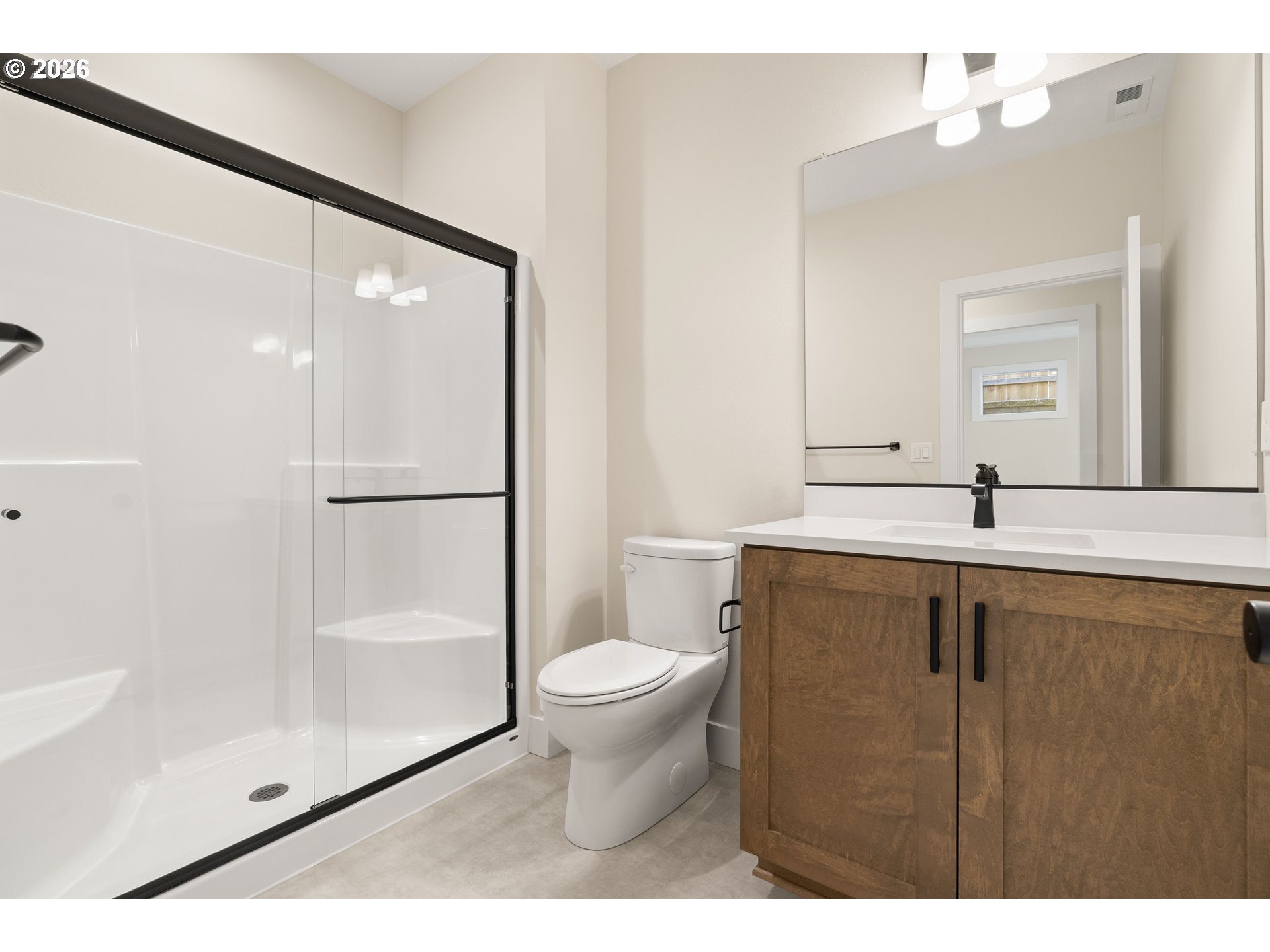 2947 Northwest 114th Terrace Portland, OR 97229 - Photo 40 of 46 a bathroom with a toilet sink and a mirror